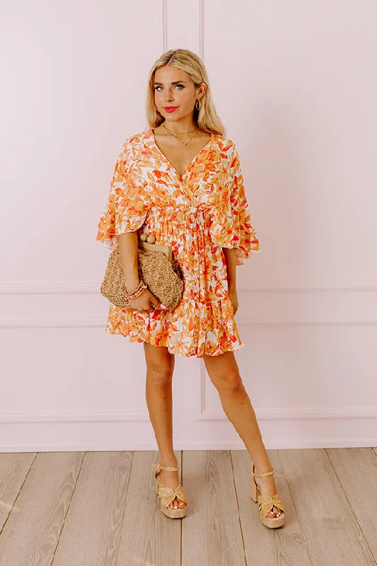 love-the-journey-floral-romper-in-orange