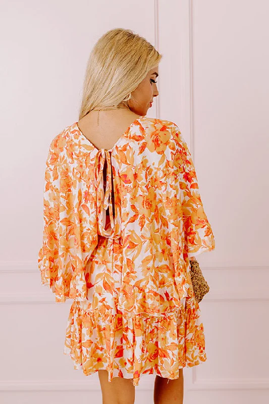 love-the-journey-floral-romper-in-orange