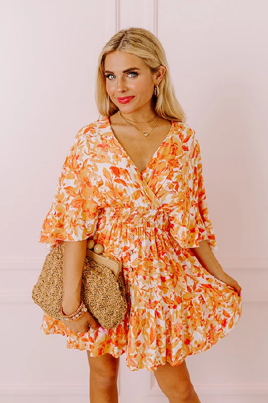 love-the-journey-floral-romper-in-orange