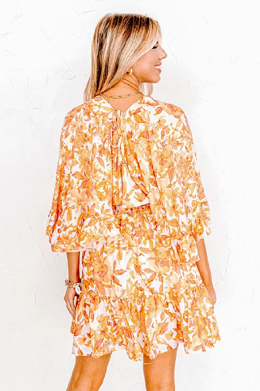 love-the-journey-floral-romper-in-orange